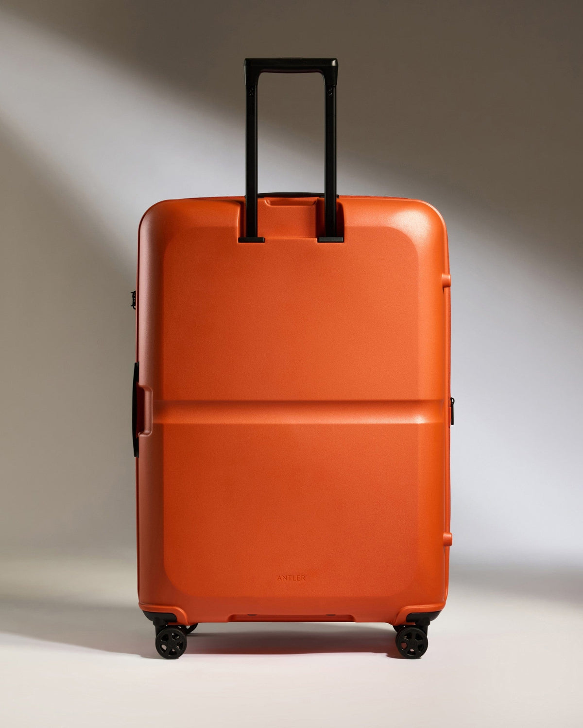 Antler Luggage - Large Suitcase in Ember Orange - Single Stripe - Hard Suitcase Large Suitcase in Orange - Single Stripe | Checked Luggage & Large Suitcases