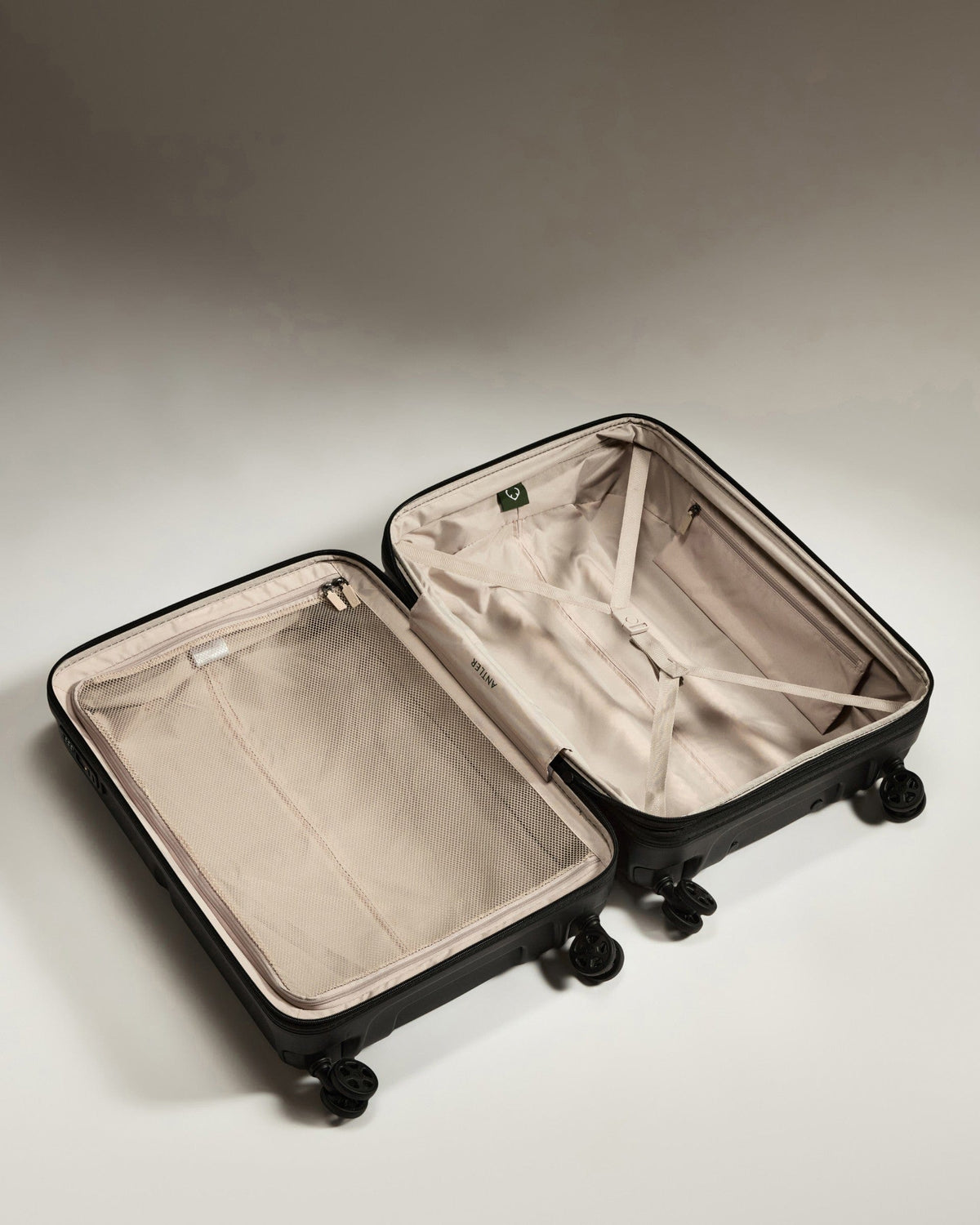 Antler Luggage - Medium Suitcase in Black - Single Stripe - Hard Suitcase Medium Suitcase in Black - Single Stripe | Check Luggage