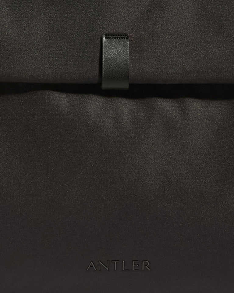a close up of a black bag
