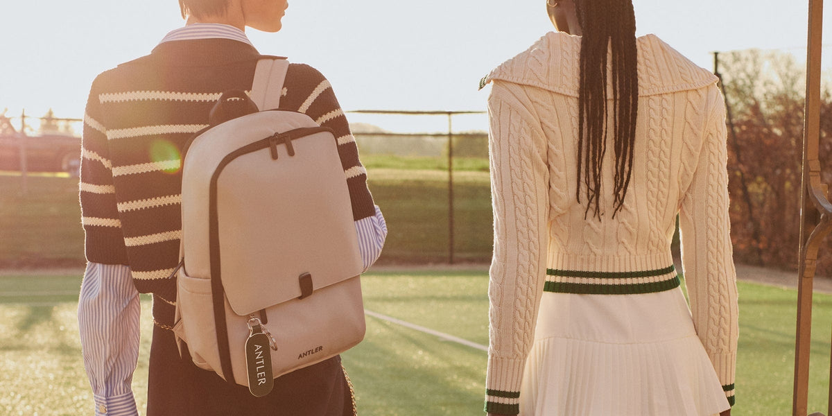 a man and woman with backpacks