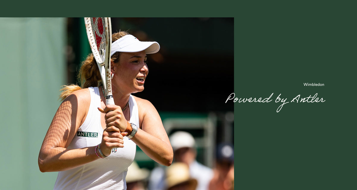a woman holding a tennis racket