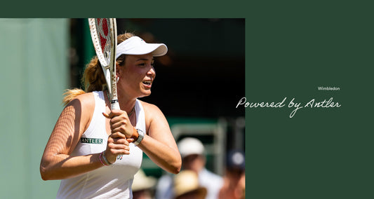 a woman holding a tennis racket