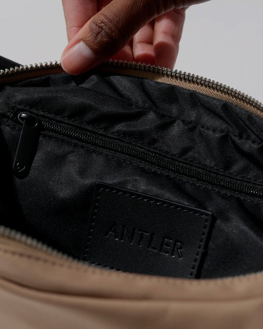 a person opening a purse
