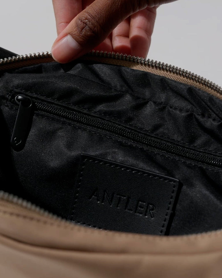a person opening a purse
