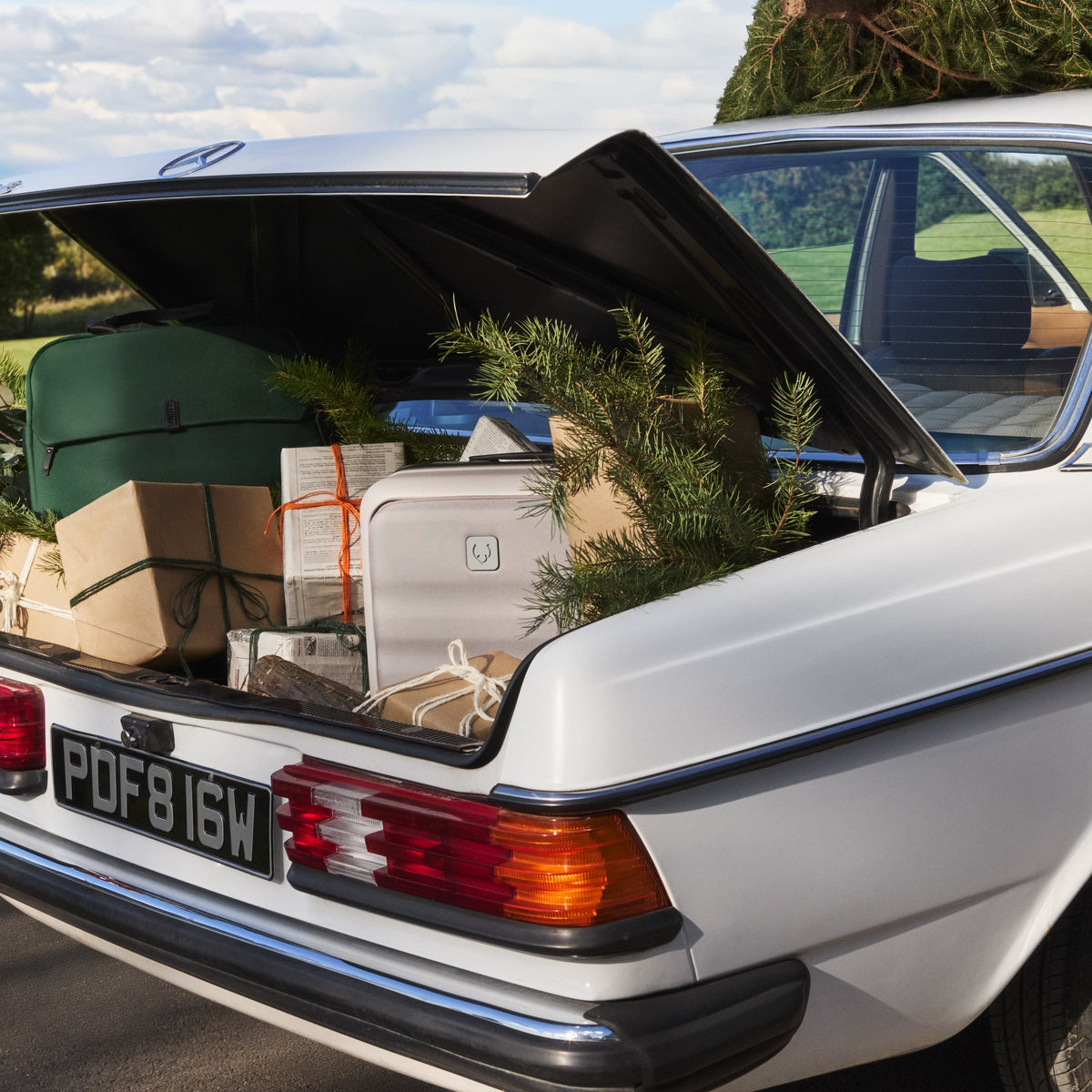 a car with luggage in the trunk
