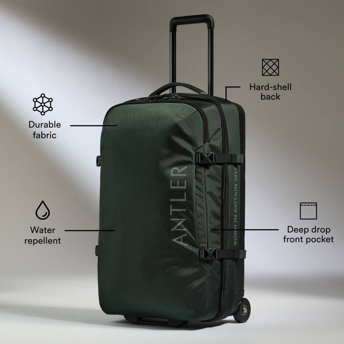 a green suitcase with text on it