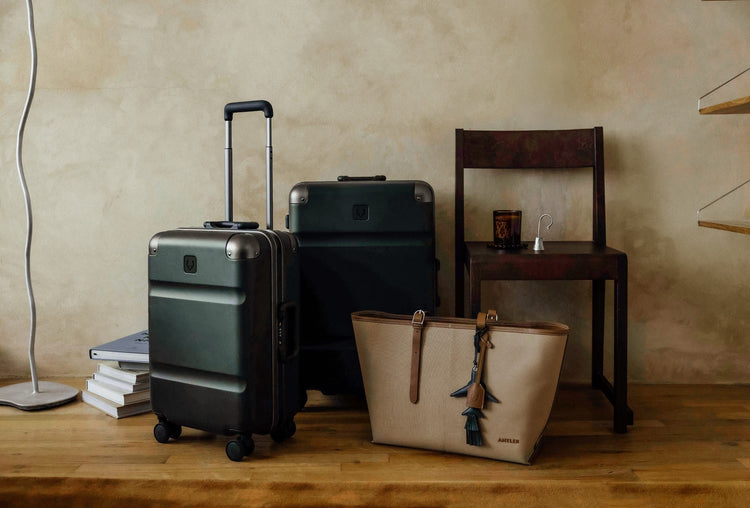 a group of luggage and a chair
