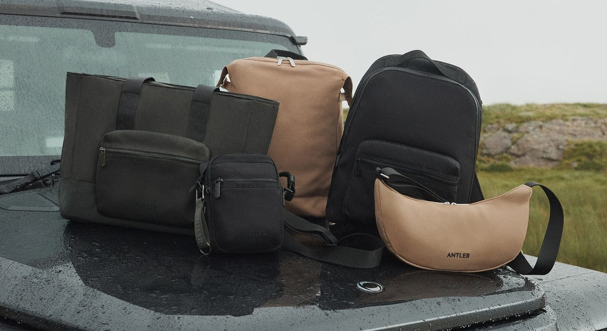 a group of bags on a car hood