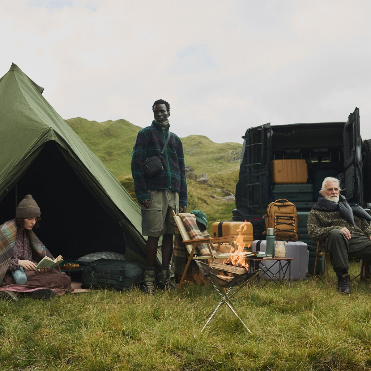 a group of people sitting in a tent