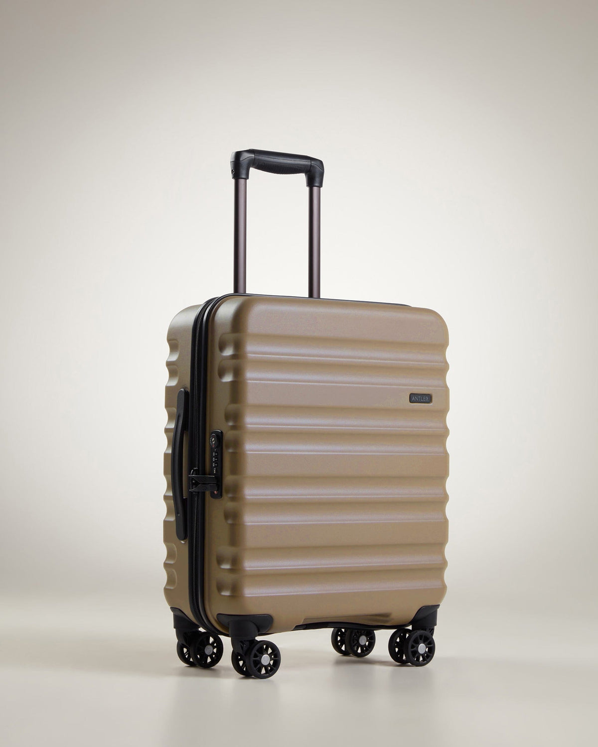 a brown suitcase with wheels