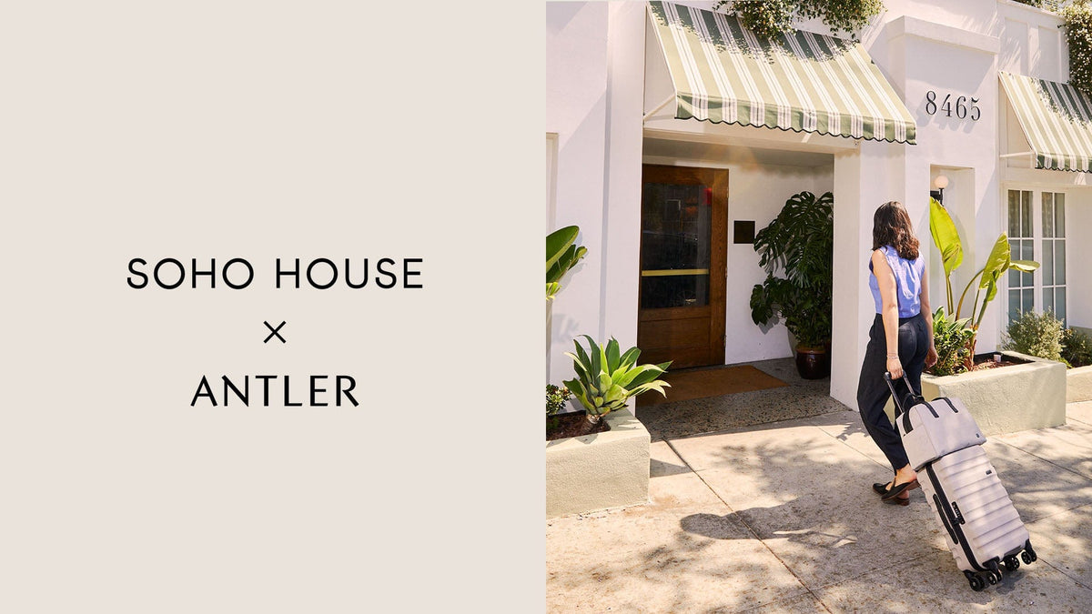 a white house with green awning