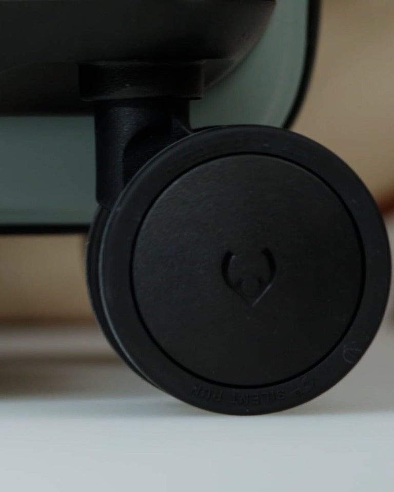 a black wheel on a chair