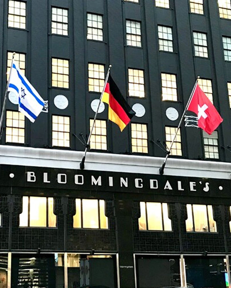 a group of flags on a building