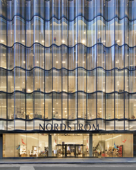 a glass building with many windows