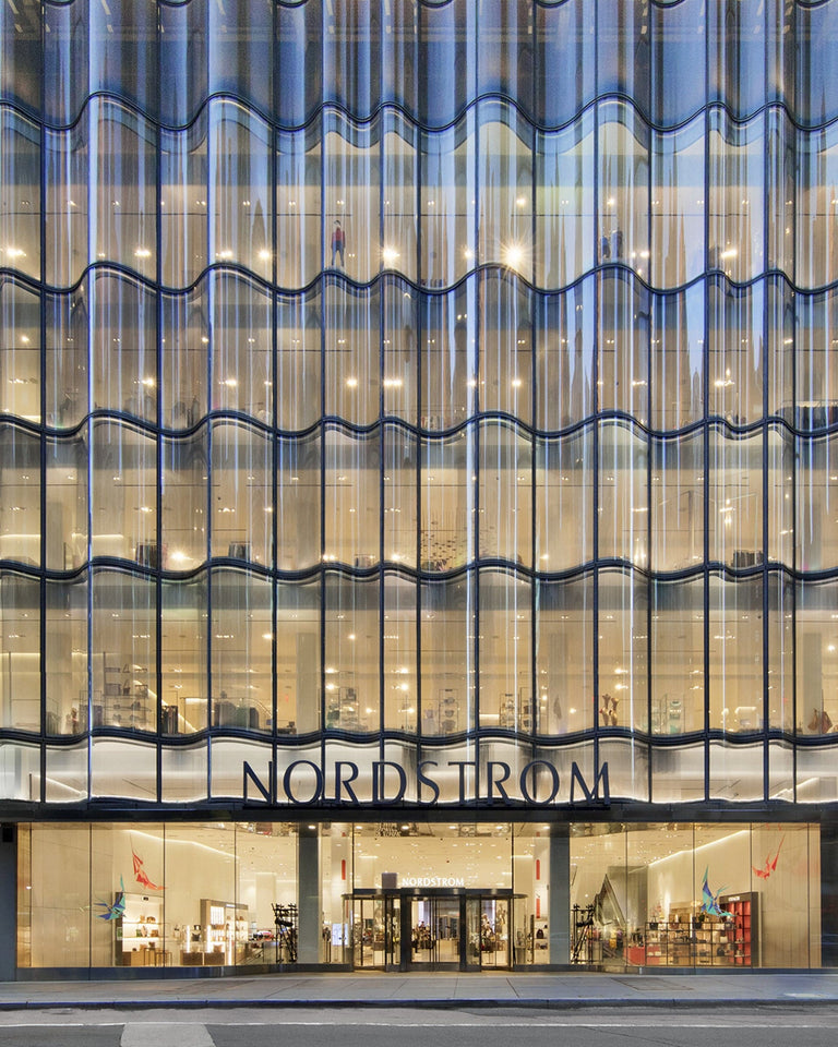 a glass building with many windows