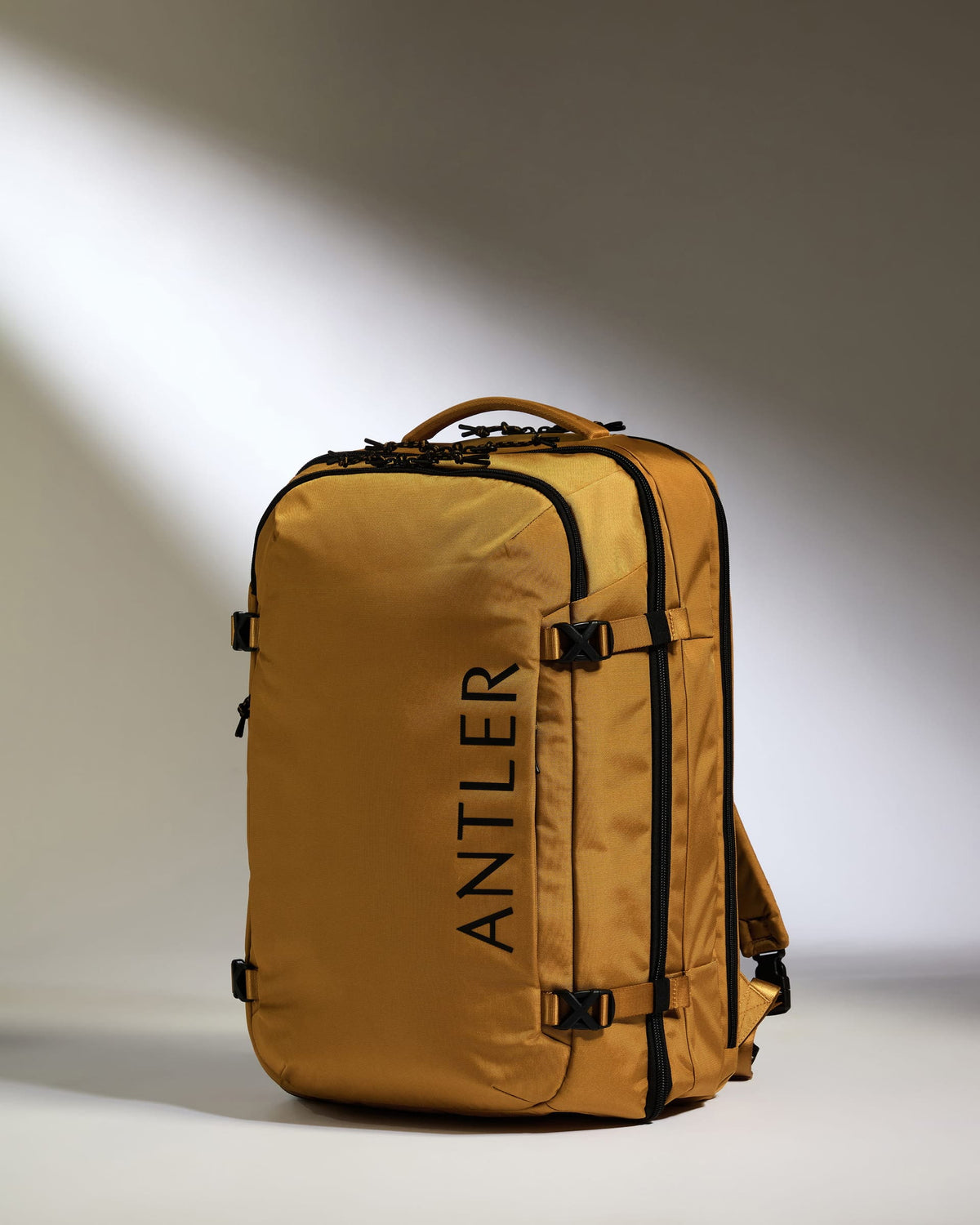 Antler Luggage -  Discovery 60L Backpack in Mustard Yellow - Backpack | Large Discovery 60L Backpack in Yellow | Rucksacks & Travel Bags