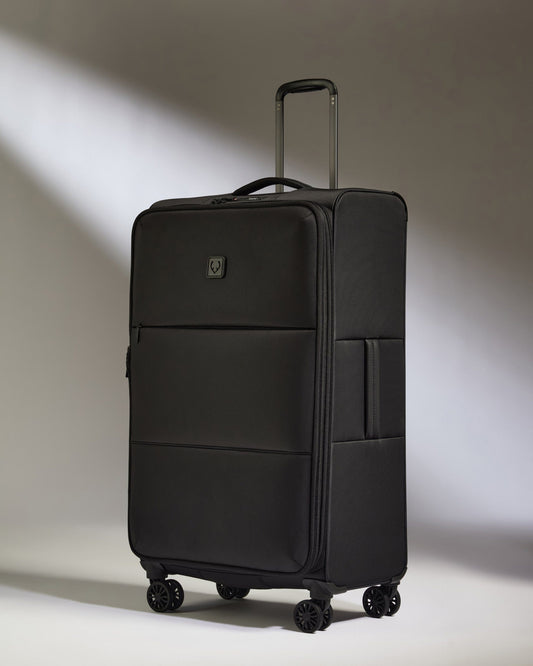 Antler Luggage -  Lightest Large Suitcase in Black - Soft Stripe 2.0 - Soft Suitcase Lightest Large Suitcase in Black - Soft Stripe 2.0 | Soft Checked Suitcase