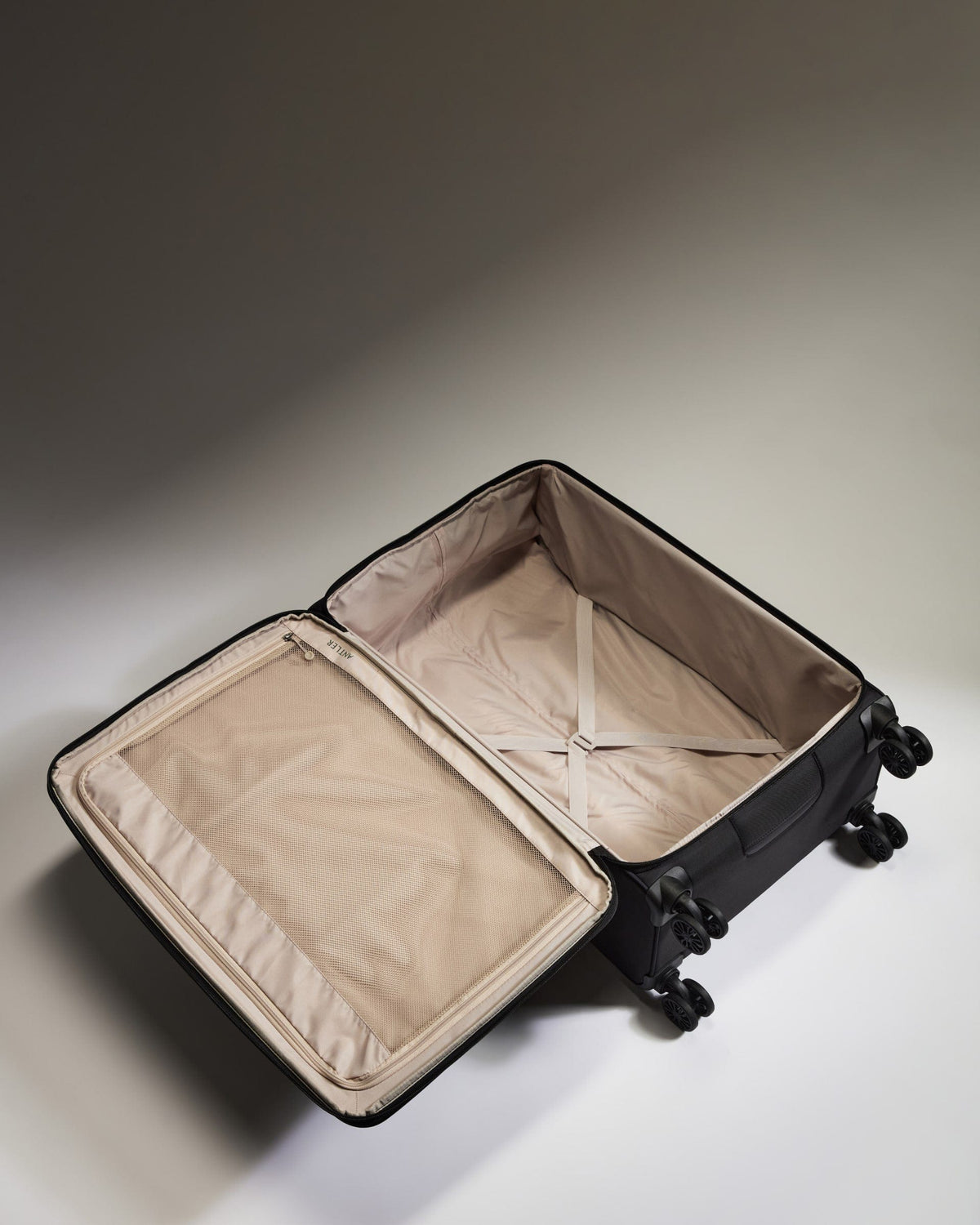 Antler Luggage -  Lightest Large Suitcase in Black - Soft Stripe 2.0 - Soft Suitcase Lightest Large Suitcase in Black - Soft Stripe 2.0 | Soft Checked Suitcase