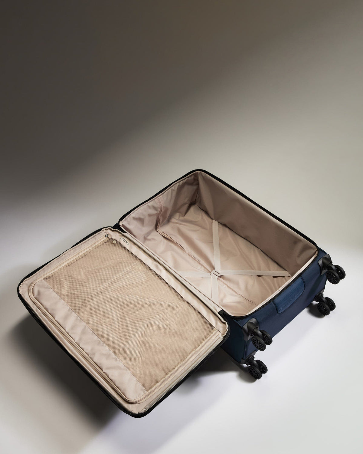 Antler Luggage -  Lightest Large Suitcase in Indigo Blue - Soft Stripe 2.0 - Soft Suitcase Lightest Large Suitcase in Navy - Soft Stripe 2.0 | Soft Checked Suitcase