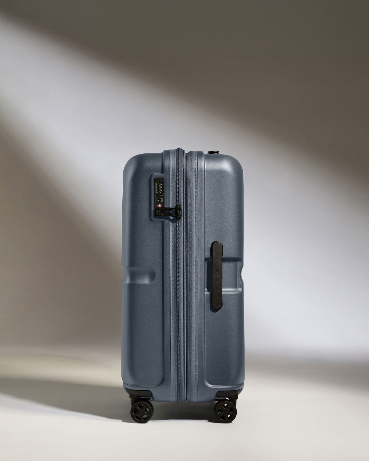 Antler Luggage -  Medium Suitcase in Atlantic Grey - Single Stripe - Hard Suitcase - Medium Medium Suitcase in Grey - Single Stripe | Check Luggage