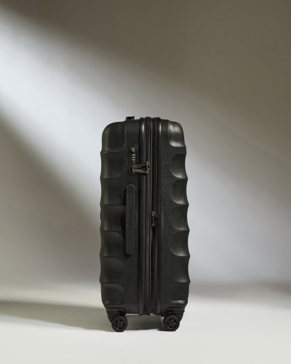 Antler Luggage -  Medium Suitcase in Black - Juno - Hard Suitcase Medium Suitcase in Black - Juno | Checked Luggage & Medium Suitcases