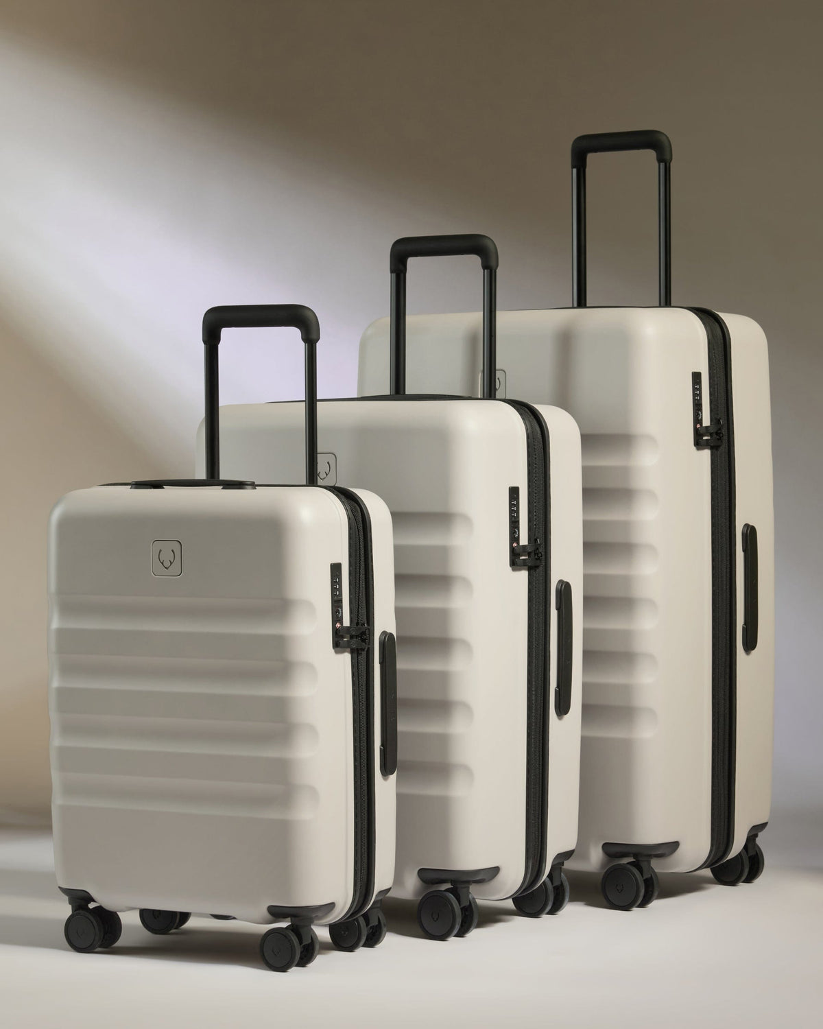 Antler Luggage -  Suitcase Set in Taupe - Icon Stripe - Hard Suitcase Suitcase Set in Taupe - Icon Stripe | Lightweight & Hard Shell Suitcase