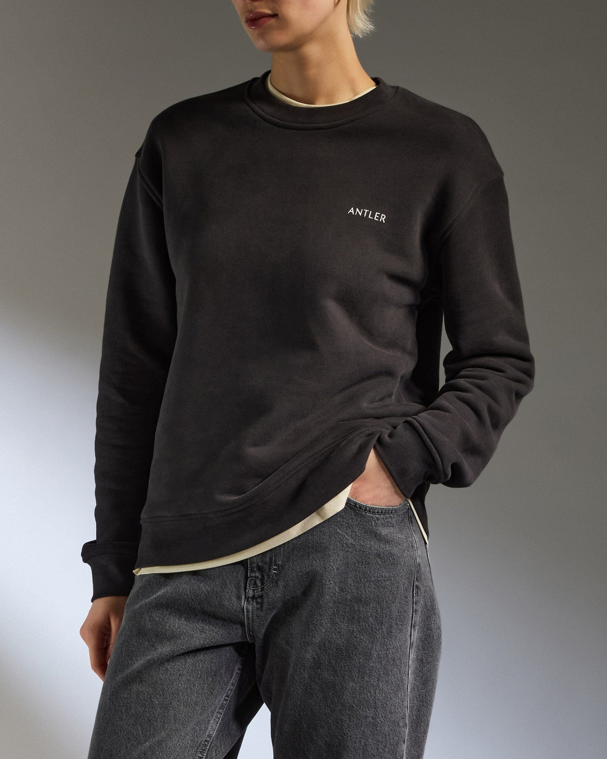 Antler Luggage -  Travel Essential Sweatshirt in Charcoal Black - Apparel Travel Essential Sweatshirt in Black | Travel Clothing & Accessories